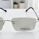 نظارة بدون إطار من التيتانيوم بلمسة ذهبية شامبانيا مصقولة