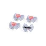 مشبك الشعر على شكل فيونكة مزين بقلوب