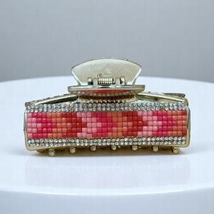 مشبك شعر نسائي مرصع بالكريستال – أناقة الغروب الوردي