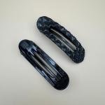 مجموعة مشابك الشعر التي تتميز بتصميمات ضفيرة ومرمرية مميزة