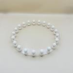 صينية أكريليك مستديرة بإطار خرز خشبي أبيض