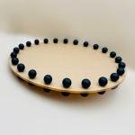 Round acrylic tray with wooden black bead rim