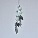 أقراط متدلية بتصميم لؤلؤي مع أوراق الشجر