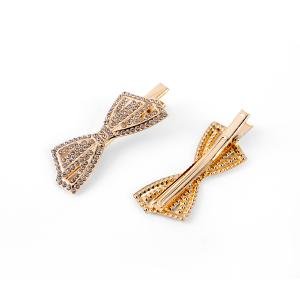 مشبك شعر بشكل فيونكة ومزخرف بأحجار الراين