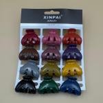 مشابك شعر صغيرة بشكل صدفة لامعة