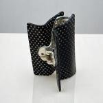 مشبك الشعر نوير دوت العتيق بلمسة لامعة وأسنان ذهبية