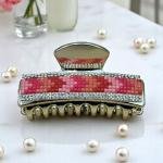 مشبك شعر نسائي مرصع بالكريستال – أناقة الغروب الوردي