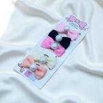 ربطات شعر مرنة بتصميم فيونكة مع لؤلؤة في المنتصف