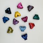 مشابك شعر صغيرة بشكل صدفة لامعة