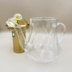 إبريق شاي زجاجي مع مصفاة ذهبية ومقبض كريستالي