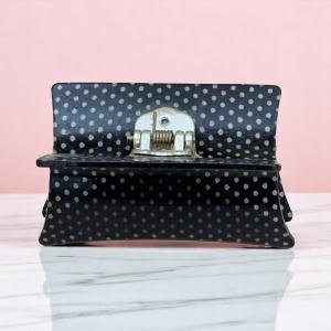 مشبك الشعر نوير دوت العتيق بلمسة لامعة وأسنان ذهبية