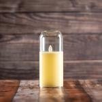 شمعة زجاجية LED بلهب متوهج وغطاء قبة