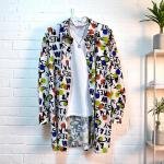 بلوزة جرافيك مطبوعة بحروف مريحة وواسعة الجزء العلوي فقط