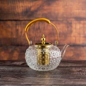 إبريق شاي زجاجي بنقشة زهور مزخرفة ولمسات ذهبية