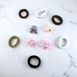 مجموعة إكسسوارات شعر للأطفال من هابي بير عبوة من أشرطة مطاطية بألوان كرتونية ومحايدة