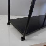 رف تخزين معدني عصري ذو 4 رفوف بعجلات